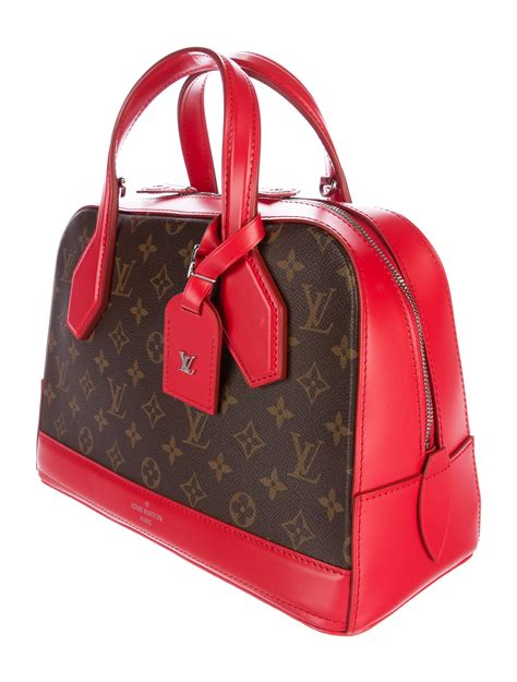 LOUIS VUITTON Dora Handbag for Women .